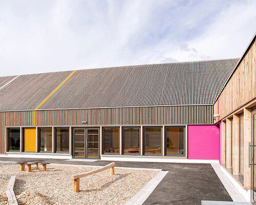 gable roofs, wooden cladding and pops of color shape FAUN's school group in rural france