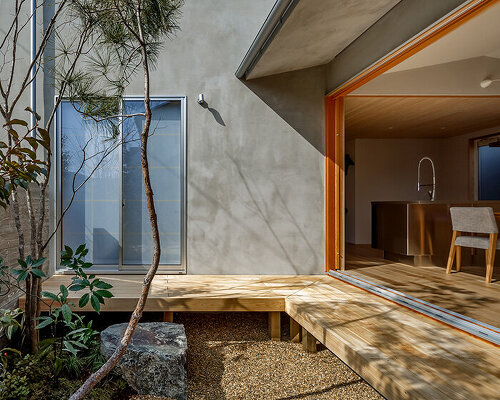 L-shaped house by hearth architects embraces vivid courtyard in japan