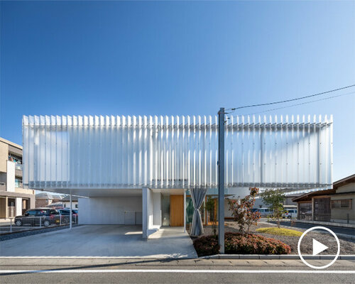 KACH wraps this house in yanakacho with a floating, translucent facade