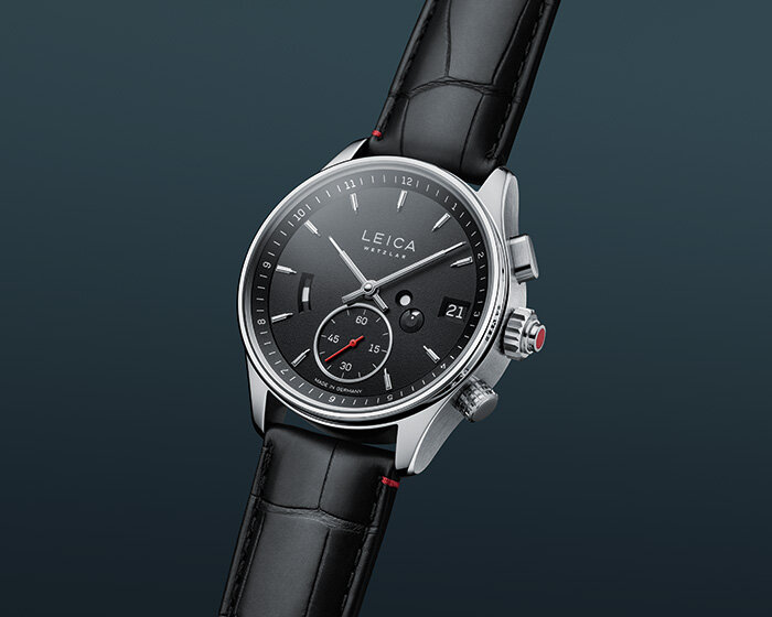 leica's new watch collection moves its famous red dot to your wrist