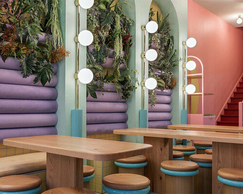 masquespacio infuses restaurant interior in france with pastel tones and lush greenery