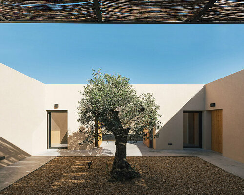 set in rural portugal, this single-volume house is shaped around a central patio