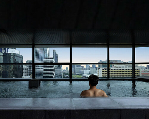 A-asterisk's skyscraper public baths frame views of bangkok city