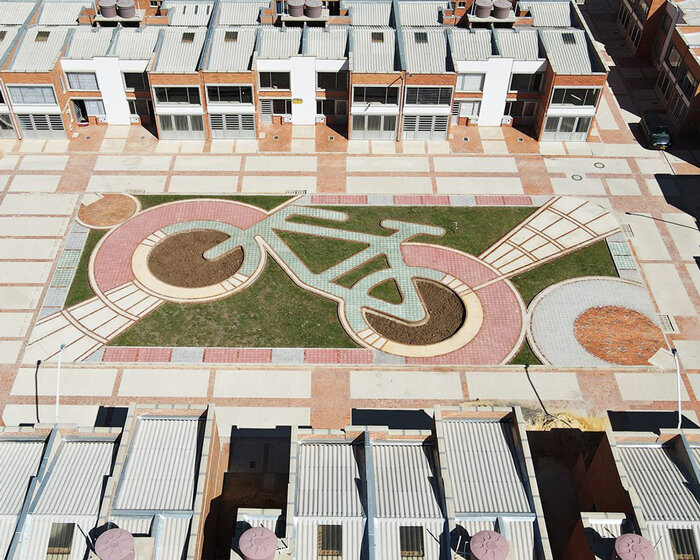 bicycle shaped park rides into an urban neighborhood of paipa, colombia