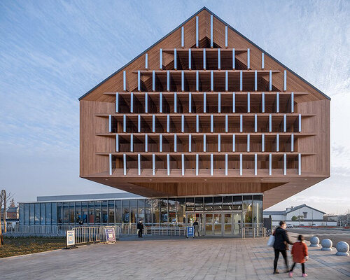 overhanging timber volume tops zhujiajiao tourist center in shangai