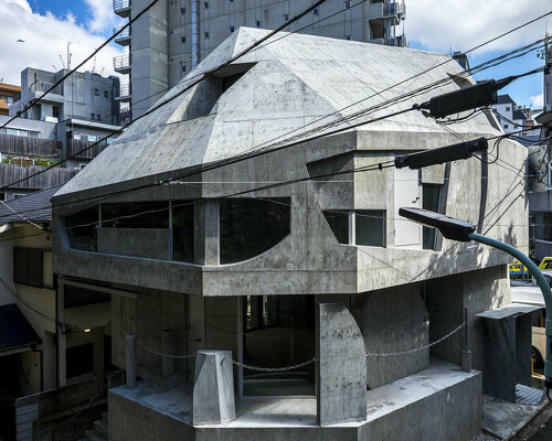 AAOAA disrupts architectural conventions with irregular concrete building in tokyo