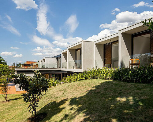 this 990 sqm house in são paulo is marked by two contrasting facades