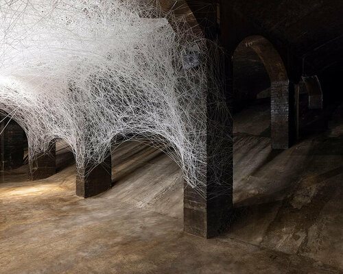 chiharu shiota takes her webs of threads to copenhagen's former water reservoir