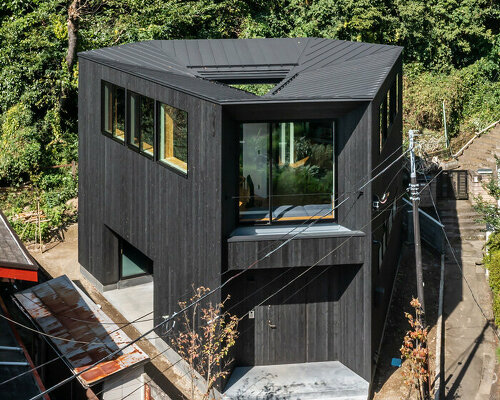 FUDO architects tops yamanone no ie house in japan with origami-like metal roof