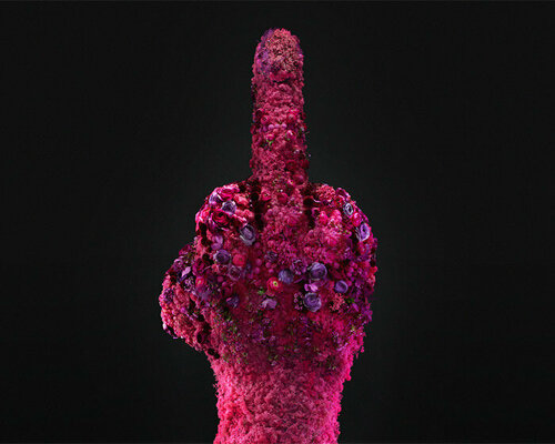 this massive middle finger sculpture made of flowers bids farewell to winter