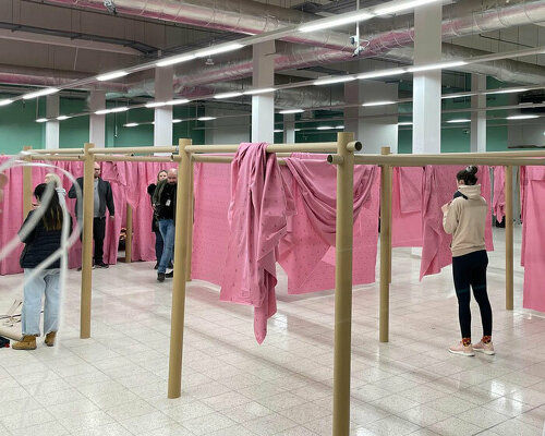 shigeru ban and VAN install paper partition shelters for ukrainian refugees in poland