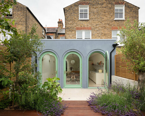 pastel colored arches complete this italian influenced extension in london