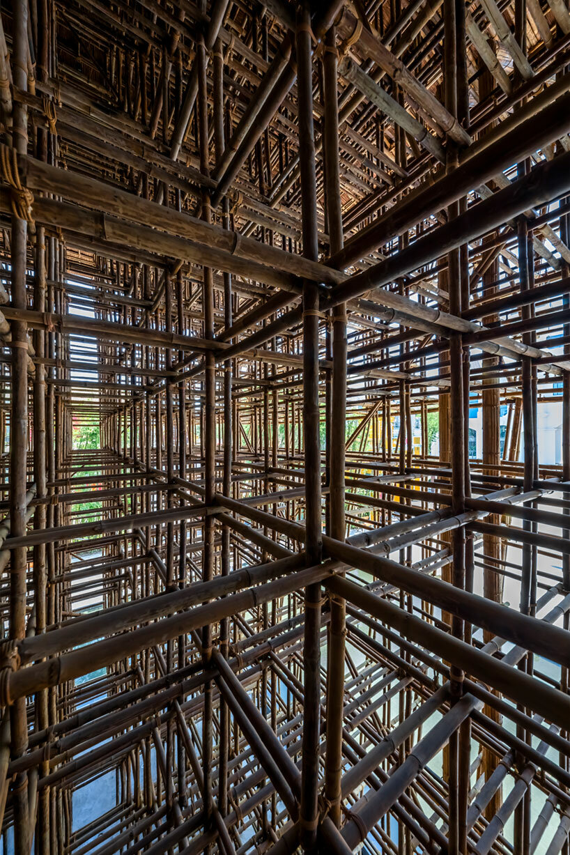 VTN architects carves out intricate bamboo center with sculptural