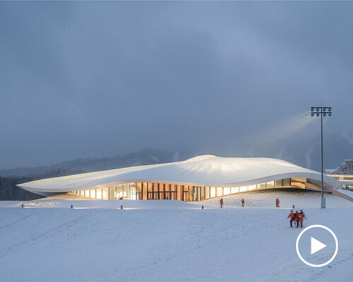 this soft rooftop by MAD architects mimics fresh powder on the mountains of yabuli