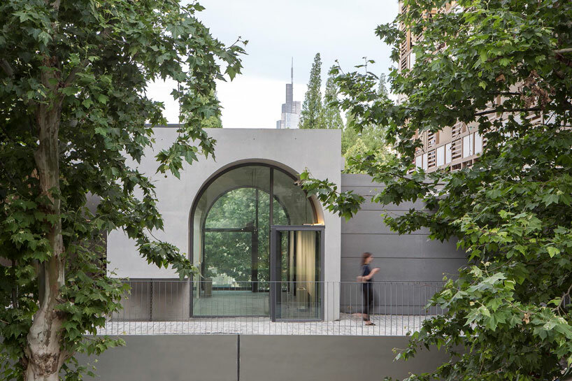 atelier diameter adds arch motifs to sculptural art gallery extension in nanjing, china