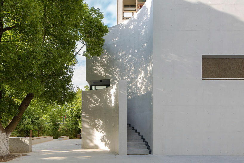 atelier diameter adds arch motifs to sculptural art gallery extension in nanjing, china