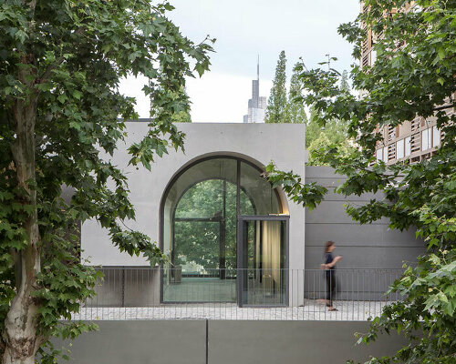 atelier diameter adds arch motifs to sculptural art gallery extension in nanjing, china