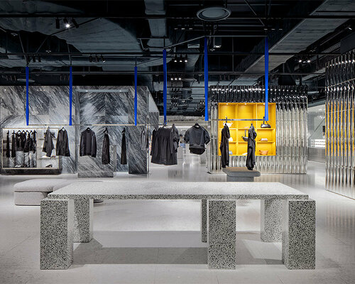 pops of blue & yellow emerge from burdifilek's hyundai seoul sculptural retail interior