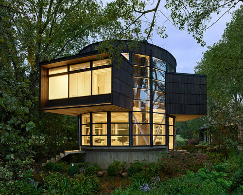 this cylindrical guest house in chile features pop-out bedroom boxes