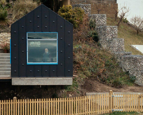 studio mutt designs 'the pottering shed' to feel like an upside down boat in the UK