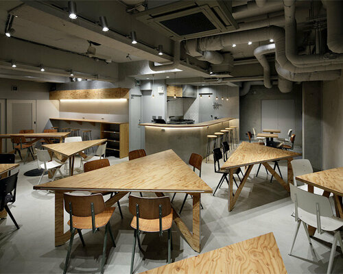 UENOA installs transformable triangular tables in underground tokyo dining space