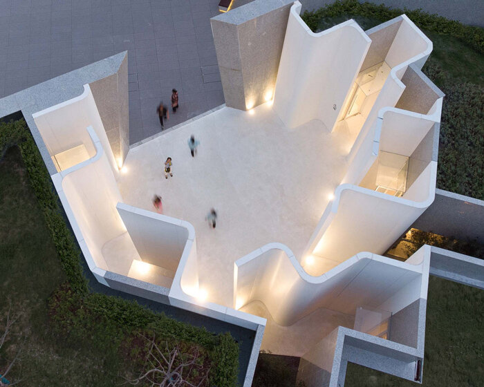 a public toilet in china's atour village is embedded into the hillside