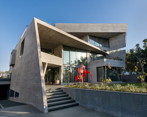 the grid architects marries brutalism with indian influences for 'beton brut' residence