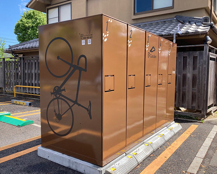 vertical bike parking lockers emerge in japan to give cyclists peace of mind