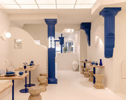 blue 3D printed ancient columns emerge from masquespacio's greek restaurant in spain