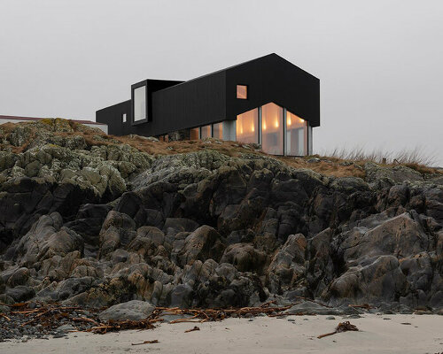 denizen works perches its luminous 'mannal house' atop the rocky coast of scotland