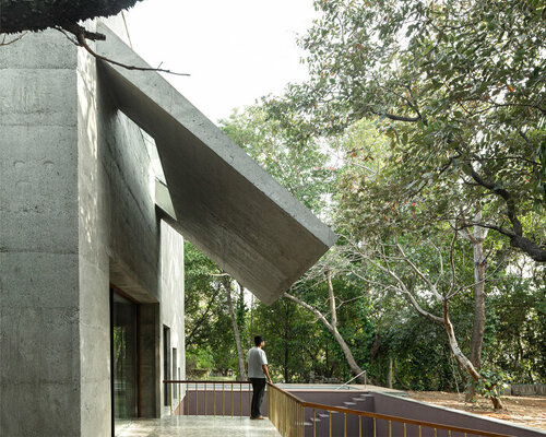 SRDA sculpts the 'house of concrete experiments' amidst an orchard in west india