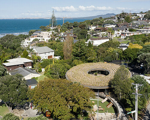 CASA tops learning center in new zealand with circular green roof canopy