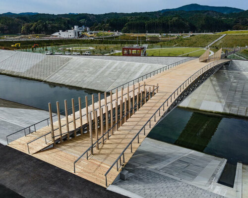 kengo kuma shapes gently arched bridge for recovering tsunami-hit town