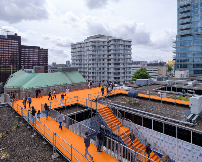 MVRDV's bright orange rooftop walk opens to the public in rotterdam