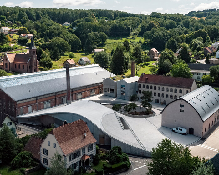 SO – IL and FREAKS extend museum in france with undulating concrete rooftop