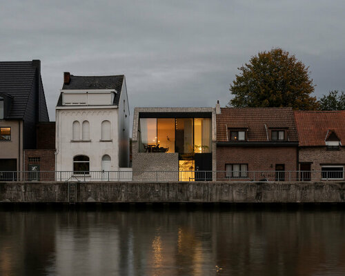 this belgian 'canal house' by studio farris is fronted by a secret garden