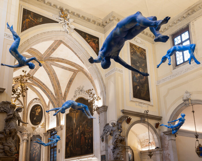 ugo rondinone brings human clouds, a gilded sun and colorful, burnt out candles to venice