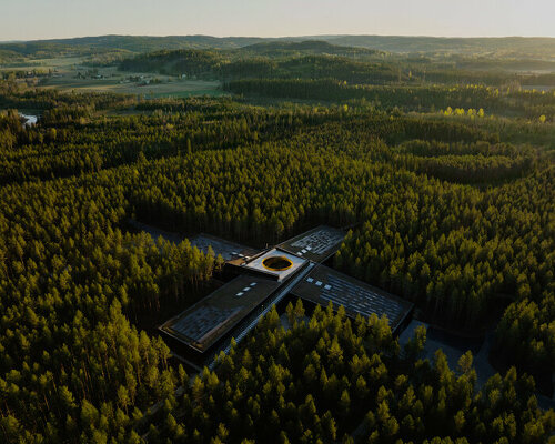 BIG's cross shaped factory in the norwegian woods gets ready for grand opening