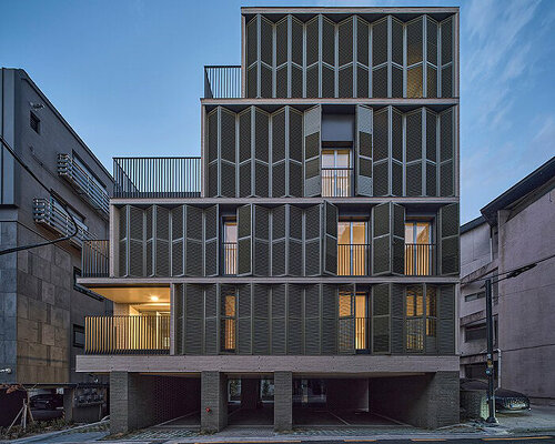 daniel valle architects' staggered villa stands out from restricted urban mass of seoul