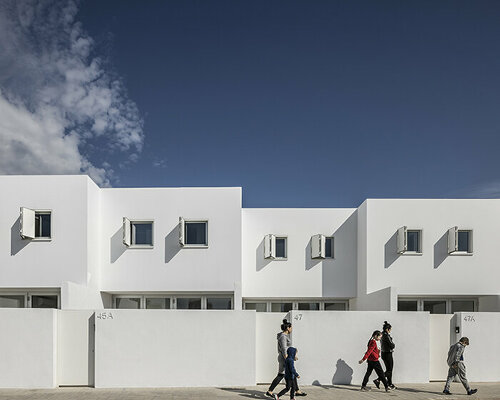 nada's all-white residential complex in valencia takes cues from mediterranean villages