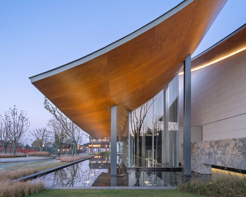 a series of hyperbolic shaped roofs tops GOA's jianli art center in china