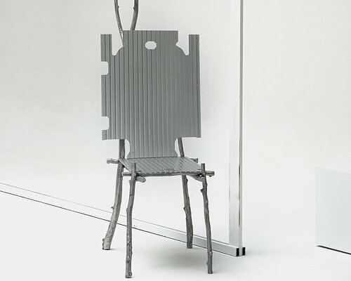 lee sisan's silver chair is made of RIMOWA's luggage pieces + cast aluminum branches