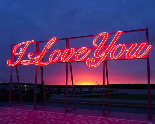 rose-hued neon monument professes its love along the alexandria waterfront in the US