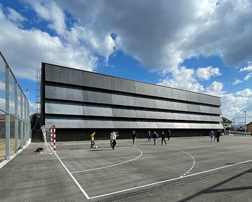 slanted prefab concrete panels front the zlatar bistrica sports hall in croatia