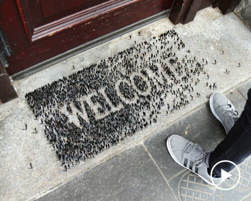 tiny figures by PEJAC drawn as WELCOME in aberdeen to support marginalized people