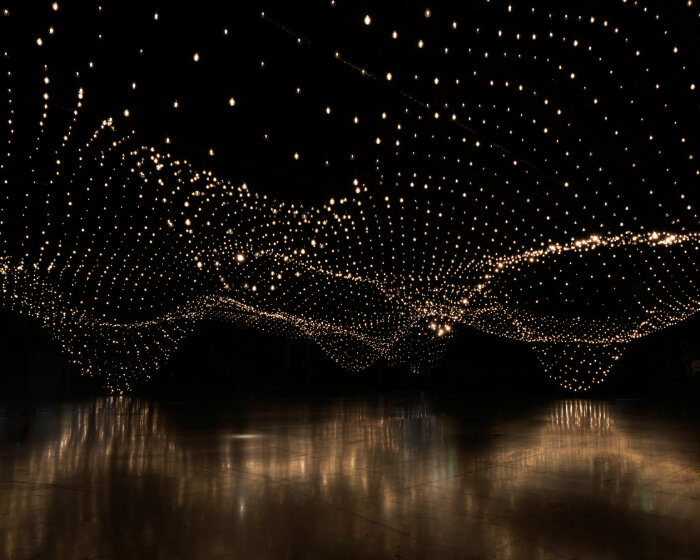 rafael lozano-hemmer's light installation in design miami/basel changes by recording people’s heartbeats