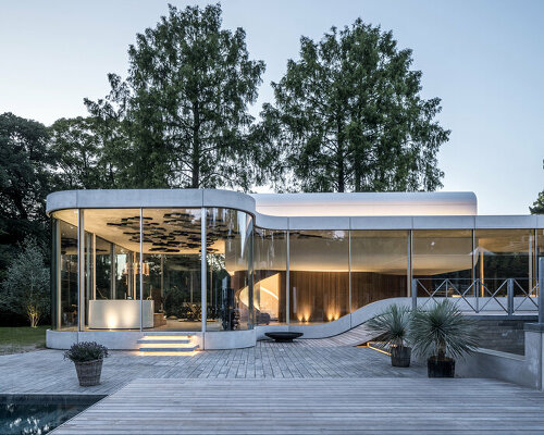 SPOL architects' villa kirk takes inspiration from melting surrealism in denmark