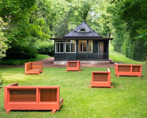 andrea zittel created five bench sculptures in soft red to gather people at esters garden house