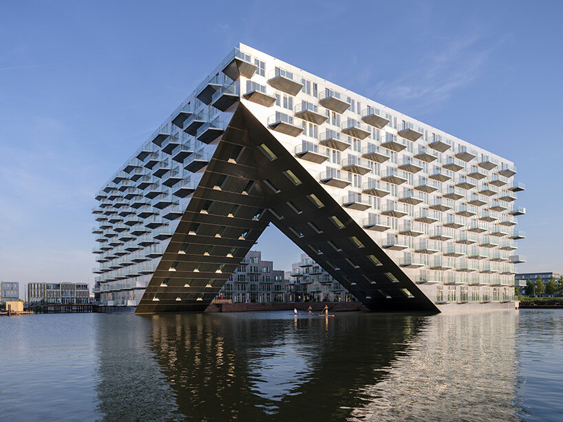 schoorsteen Uitgaan van deadline bjarke ingels + barcode architects unveil 'sluishuis' housing in amsterdam