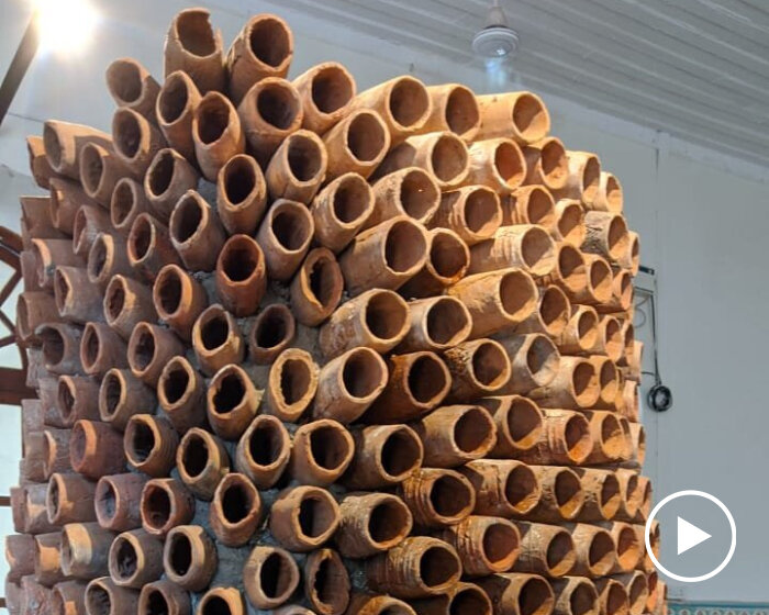 terracotta pipe installations cool down and purify humid, hot air using evaporation